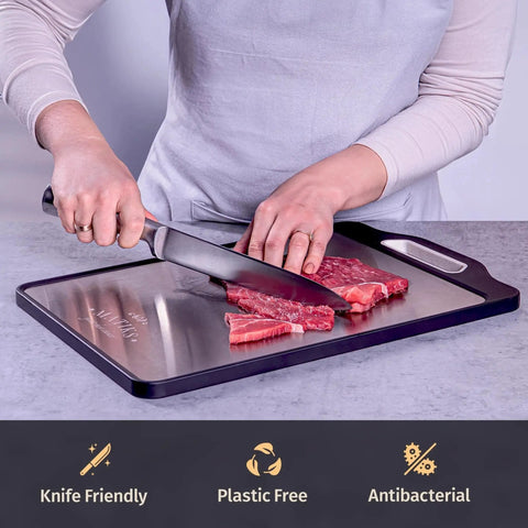 Person slicing meat on Large 16 By 11 Inch Stainless Steel Cutting Board Set Double Sided With A Stainless Meat Surface And Wheat Straw Produce Surface Dishwasher Safe Kitchen Essential And Perfect Housewarming Gift For New Home Or First Apartment Cooking
