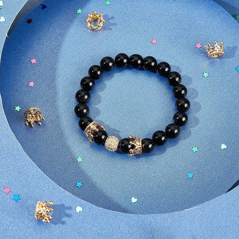 Golden Crown Beads Set 11x7mm Large Hole Crystal Cubic Zirconia Pave King Crown Charms on black bracelet with scattered beads