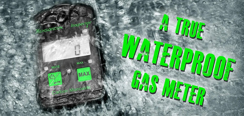 Industrial CO Carbon Monoxide Monitor submerged in water showing waterproof capability with Sensorcon brand visible.