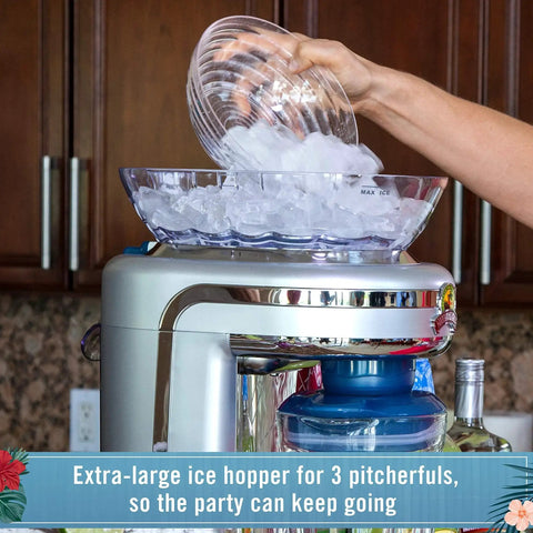 Front view: Margaritaville Key West Frozen Concoction Maker with XL ice reservoir; person pours ice into clear hopper