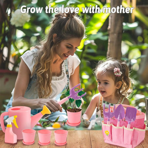 Mother and child using Pink Kids Gardening Tools Set With Rake Shovel Trowel Watering Can Gloves Apron Tote Bag for garden play.