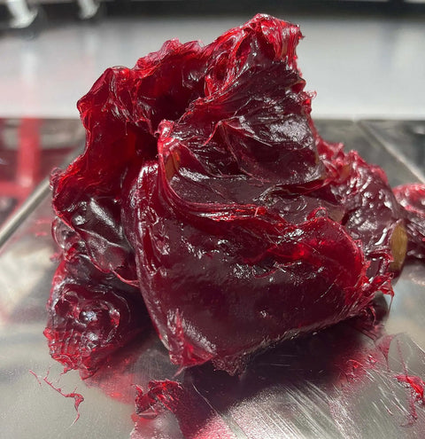 Close-up of red lithium grease from Go To Lithium Grease Superkote 2000 NLGI 2 EP Grease For High Temperature Heavy Duty Use.