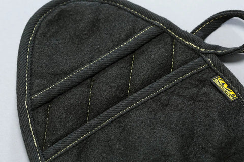 Black X Pad Suppressor Handler for Tactical Duty Gear with CarbonX heat resistance, heavyweight felt, and Kevlar stitching detail