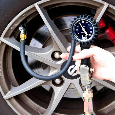 JACO FlowPro Tire Inflator with Pressure Gauge, 100 PSI, black hose connected to car tire valve