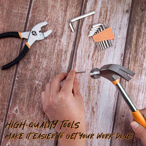 Person using hammer from 39 Piece Home Tool Set With Plastic Toolbox Storage Case Orange For DIY Projects And Everyday Household Repairs Includes Hammer Pliers Screwdrivers Tape Measure And More With Sturdy Heat Treated Chrome Plated Tools on wooden surface. Display of tools including pliers and hex keys in background.