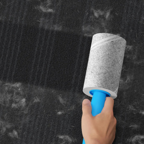 Using Extra Sticky Lint Roller Mega Value Set with 400 Sheets for pet hair removal on carpet, highlighting easy tear diagonal peel design.