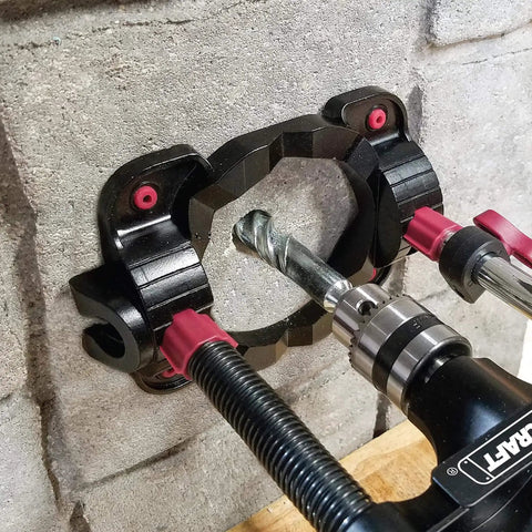 Portable Drilling Guide Attachment For Straight And Angled Holes With Adjustable Angle Readout in use on concrete wall