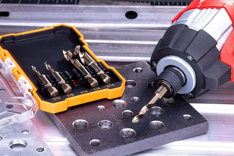 Five-Piece M35 Cobalt Stubby Drill Bit Set For Stainless Steel And Other Hard Metals With One Quarter Inch Hex Shank shown with bits and drill.