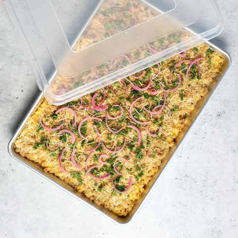 Extra Large High Sided Baking Pan With Lid For Big Batches Uncoated Aluminum Sheet Pan with cooked dish inside