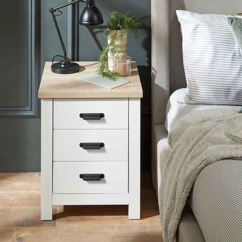 Bedroom nightstand with Six Pack Black Cabinet Cup Pulls And Drawer Handles on white drawers, 5.04 Inch zinc alloy bar pulls