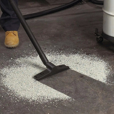 1.5 Inch Diameter Wet Dry Vacuum Accessory Kit with 12 Inch Floor Nozzle cleaning debris in workshop