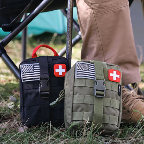 Emergency Trauma Kit With CAT Gen 7 Tourniquet And 36 Inch Splint For Outdoor Adventures Camping Hiking And Survival IFAK, black bag next to leg.