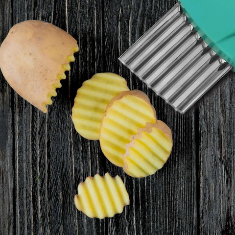 Two-Piece Stainless Steel Crinkle Cutter Set For Fries And Wavy Chips Veggies And Fruits on black surface with potato slices