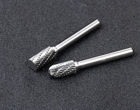 Close-up of 10 Piece Double Cut Solid Carbide Rotary Burr Set For Die Grinders With One Quarter Inch Shank Pro Grade Bits.