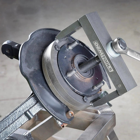 Master Wheel Hub And Bearing Remover And Installer Kit for front and rear bearings, shown in use with no shop press needed.
