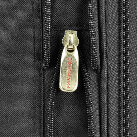 Close-up of New Yorker Lightweight Expandable Rolling Luggage Set By U S Traveler zipper showing tear-resistant fabric and expandable feature.