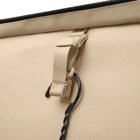 Close-up of the Large 29 Inch Expandable Spinner Checked Luggage For Travel With One Touch CX Compression, Briggs And Riley.