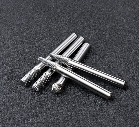 10 Piece Double Cut Solid Carbide Rotary Burr Set For Die Grinders With One Quarter Inch Shank Pro Grade Bits For Steel And Metal Carving Polishing Engraving And Drilling Durable Long Lasting Heat Treated For Smooth Finishes And Clean Edges By YUFUTOL