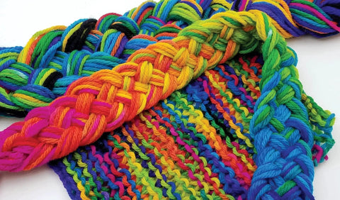 Colorful woven fabric showcasing rainbow hues dyed using Jet Black Acid Dye For Wool Silk Feathers And Nylons 8 Oz Net Weight Jacquard.