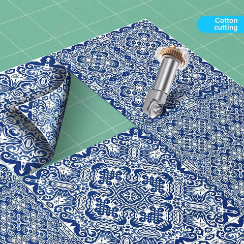 Rotary Blade And Drive Housing For Maker 3 And Maker 4 cutting patterned cotton fabric on a green cutting mat