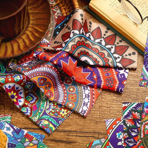 Mandala Pattern Microfiber Cleaning Cloths 24 Pack for Glasses and Camera Lenses in assorted colorful designs spread on a table