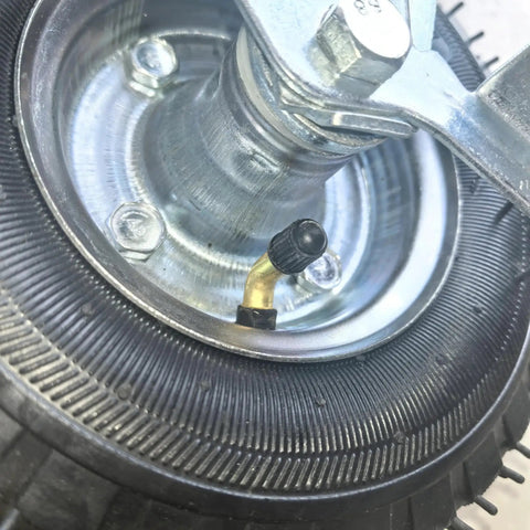 8-inch pneumatic caster wheel with black rubber tire and metal swivel mount, close-up view