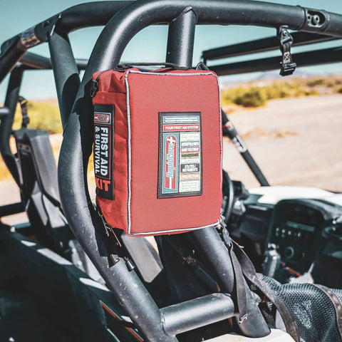 Grab-And-Go First Aid Kit with 300+ Pieces Plus Bonus 95-Piece Travel Pack mounted on off-road vehicle roll bar