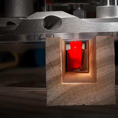 Close-up of Three Eighths Inch Double Flute Straight Router Bit Red Carbide Hi Density installed in wooden block