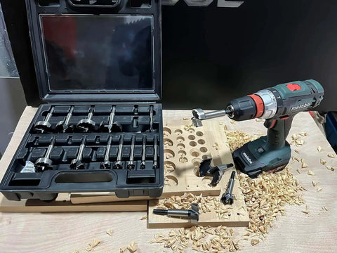 Forstner Bit Set 16 Piece Hex Shank Wood Drill Bits Kit for Flat Bottom Holes with drill and wood shavings