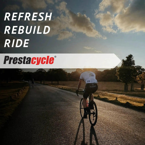 Cyclist riding on a rural road at sunset, promoting Prestaflator Rebuild Kit With O Rings And Seals For Hose Trigger And Pressure Release Fits 2010 And Newer Tools For Bicycles Pro Grade Buna N BN70 Rubber