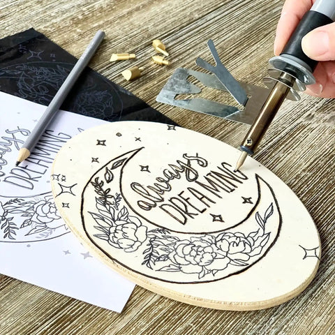 Using Starter Wood Burning Kit With Burner Pen, 5 Interchangeable Tips, 48-Piece Deluxe Pyrography Set on wooden plaque