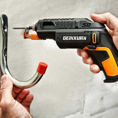 Man using GEINXURN tool to install hook with a screw in a wall.