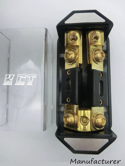 Two Way ANL Fuse Holder For Car Audio One Zero Gauge In Two Four Gauge Out Gold Plated Terminals Includes Two 100 Amp Fuses Up To 300 Amp Power Distribution Block, top view showing gold terminals and transparent cover