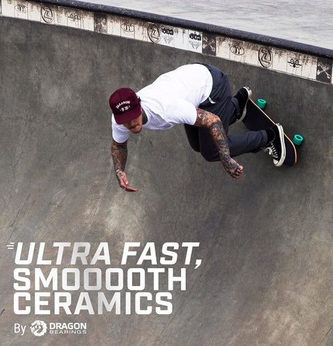 Dragon Bearings ceramic skateboard bearings 8-pack; skateboarder in a bowl performing a trick, white shirt, maroon cap