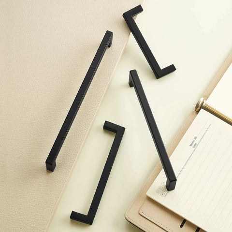 10 Pack Solid Aluminum Matte Black Cabinet Pulls with 5 Inch Hole Center Square Style Handles shown on a light surface