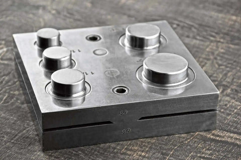 Front view of Pro Grade 2 Inch Disc Cutter Kit with six punches designed for jewelry and metalworking in aluminum, brass, and more.