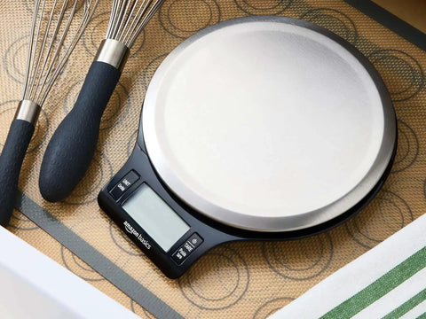 Top view of Digital Kitchen Scale With Large LCD Display And Tare Function Pro-Grade Measures In Pounds Ounces Grams Milliliters Stainless Steel