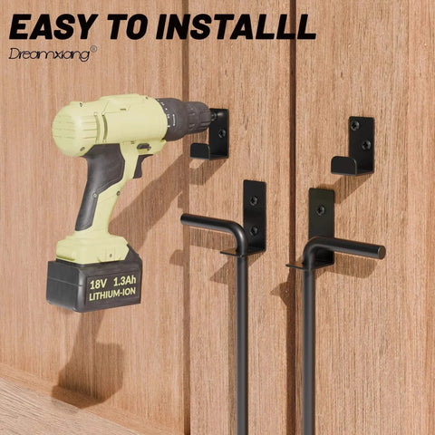 Installation of 12 Inch Heavy Duty Cane Bolt Gate Drop Rod Set on wood fence with power drill, includes extra thick ground latch, black solid steel.