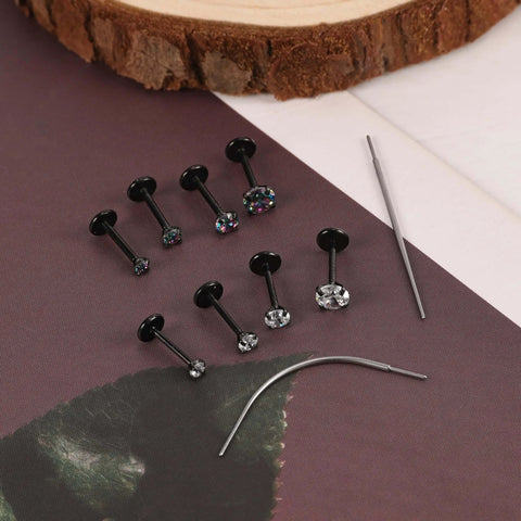 Black Threadless Nose Stud Set 18G And 20G Hypoallergenic Nostrial Tragus Lip Medusa Cartilage Helix Conch Piercing Jewelry on display