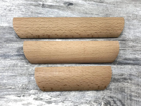 Unfinished Beech Wood Furniture Pulls Set Of 10 Paintable Wooden Cupboard And Drawer Handles on wood surface