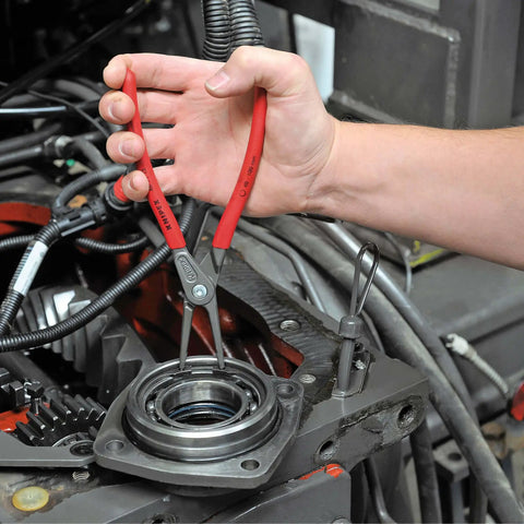 Knipex Internal Precision Snap Ring Pliers Go To Pro Grade Tool For Internal Circles held by hand installing snap ring