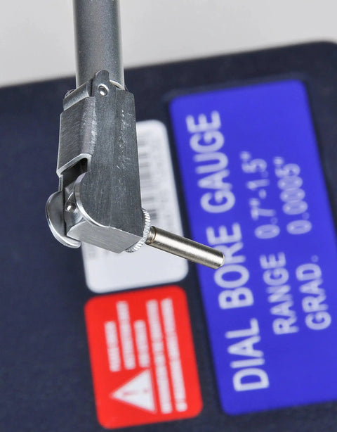 Dial Bore Gage Set With 0.7 To 1.5 Inch Range, 0.0005 Inch Dial Readout, close-up of chrome plated handle and carbide tipped anvils.