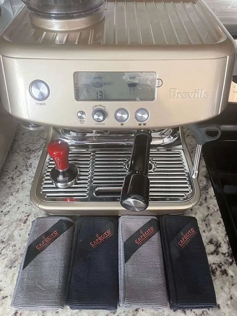 Barista Microfiber Cloths 4 Pack For Espresso Machines And Coffee Stations Pro Grade Cleaning Towels displayed near espresso machine