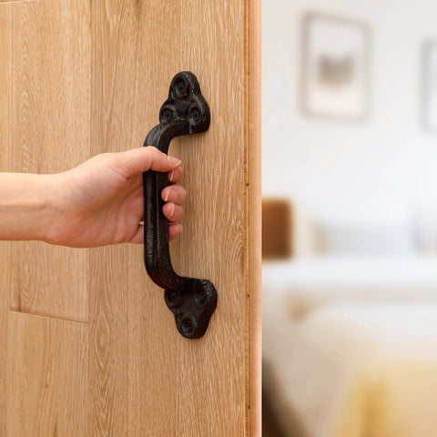 Beefy Heavy Duty Barn Door Handles Set Of 2 Black Rustic Cast Iron Gate Handles installed on a wooden sliding door