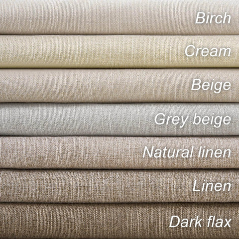 Stack of linen fabric samples in neutral colors labeled Birch, Cream, Beige, Grey Beige, Natural Linen, Linen, Dark Flax
