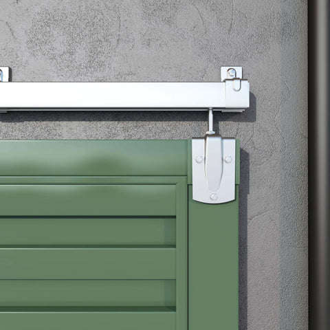 Heavy Duty 10 Foot Galvanized Outdoor Sliding Barn Door Hardware Kit With 450 Lb Capacity Exterior Track System Installed on Green Door