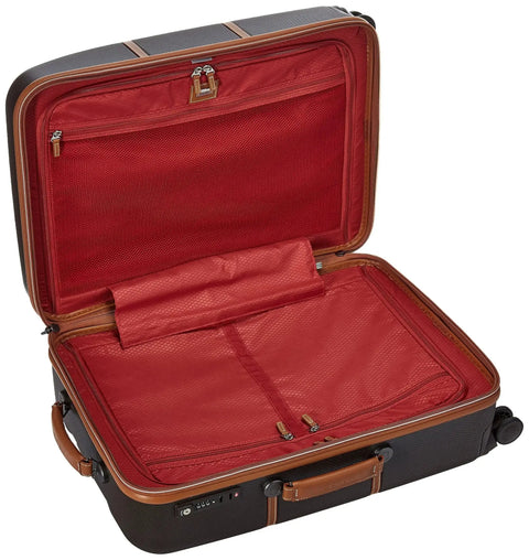 Open interior view of Chatelet Hard Plus Hardside Luggage With Spinner Wheels in Chocolate Brown showing red lining and compartments.