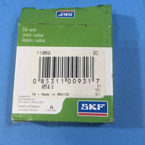SKF oil seal package with product code 11052, label includes "Oil Seal For Radial Shaft 1.125 Inch Shaft 1.375 Inch Outer Diameter 0.125 Inch Width Fluoro Rubber Lip HM14 Design SKF Small Bore Seal 11052 Replacement For Heavy Machinery And Industrial Equipment" and barcode.