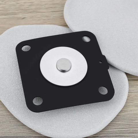 Replacement diaphragm repair kit component: black square mounting plate with white circular diaphragm and central metal plug
