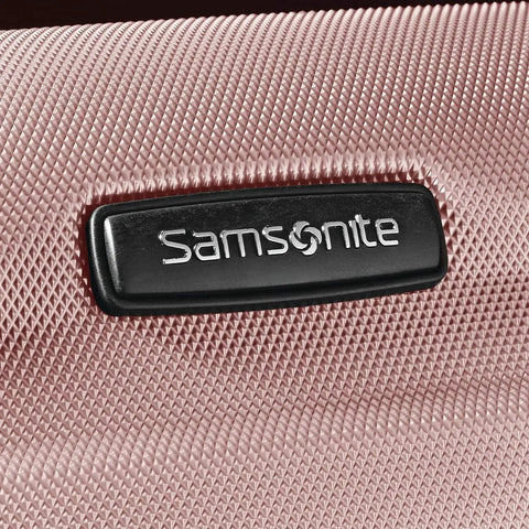 Close-up of Omni PC Hardside Expandable Luggage Set With Spinner Wheels 20 24 28 Pink For Travel showing Samsonite logo